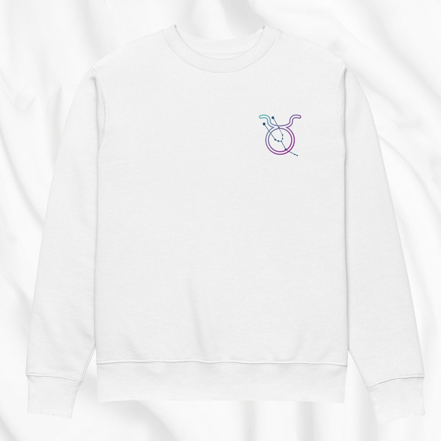 White sweatshirt with a colorful zodiac design on a white background
