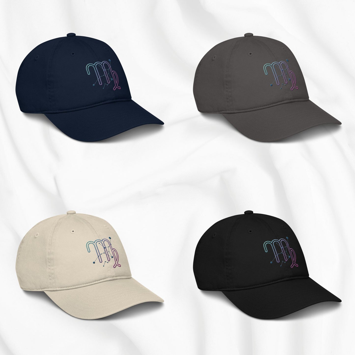 Four baseball caps in different colors with embroidered virgo zodiac designs on a white background