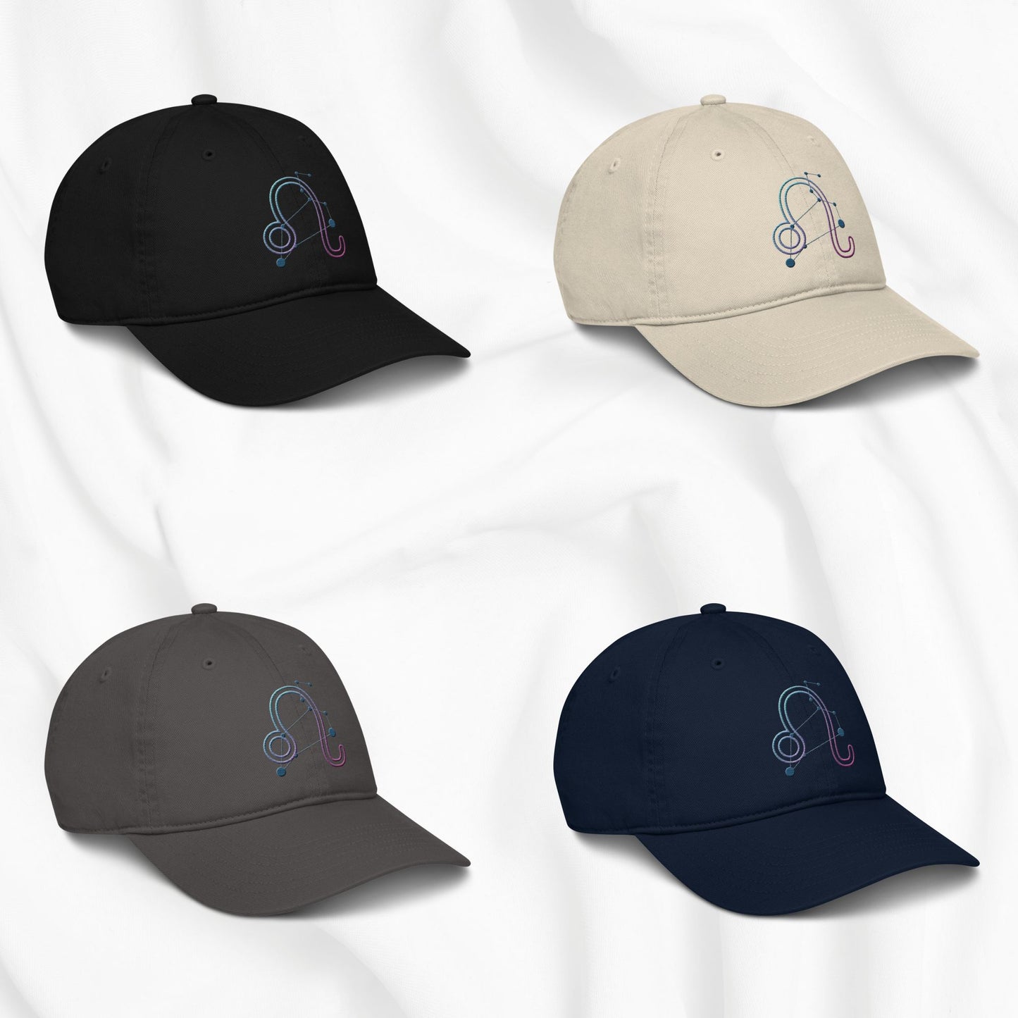 Four baseball caps in black, beige, gray, and navy with an embroidered Leo zodiac design on a white background