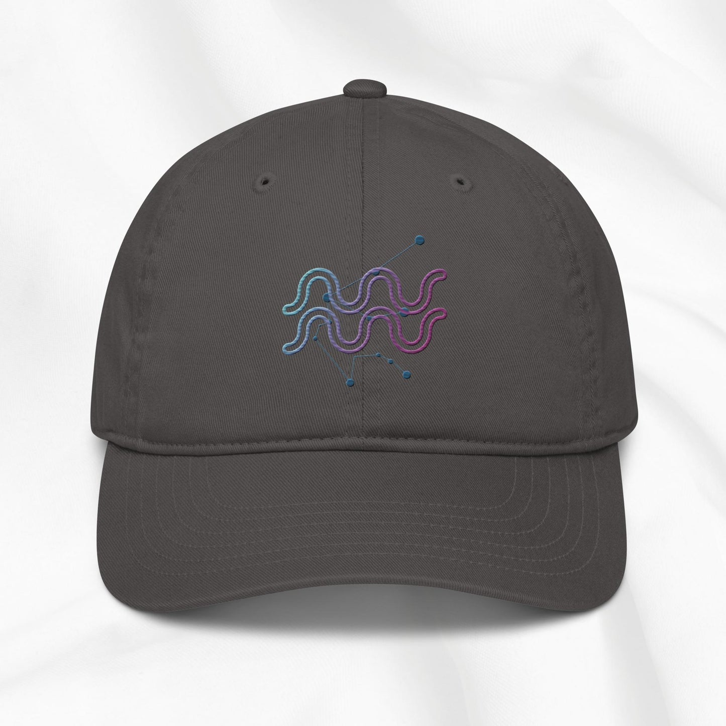 Organic cotton baseball cap in beige with zodiac design embroidered in multi color