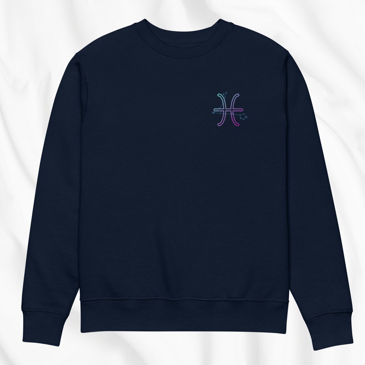 Navy blue sweatshirt with a colorful PRINTED symbol on a white background