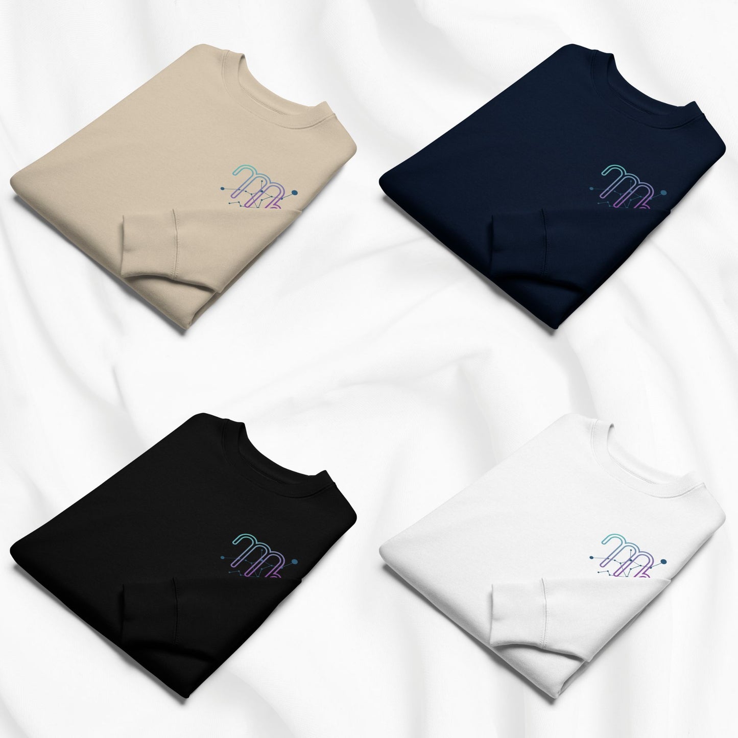 Four folded sweatshirts in beige, navy, black, and white with a logo on a white background