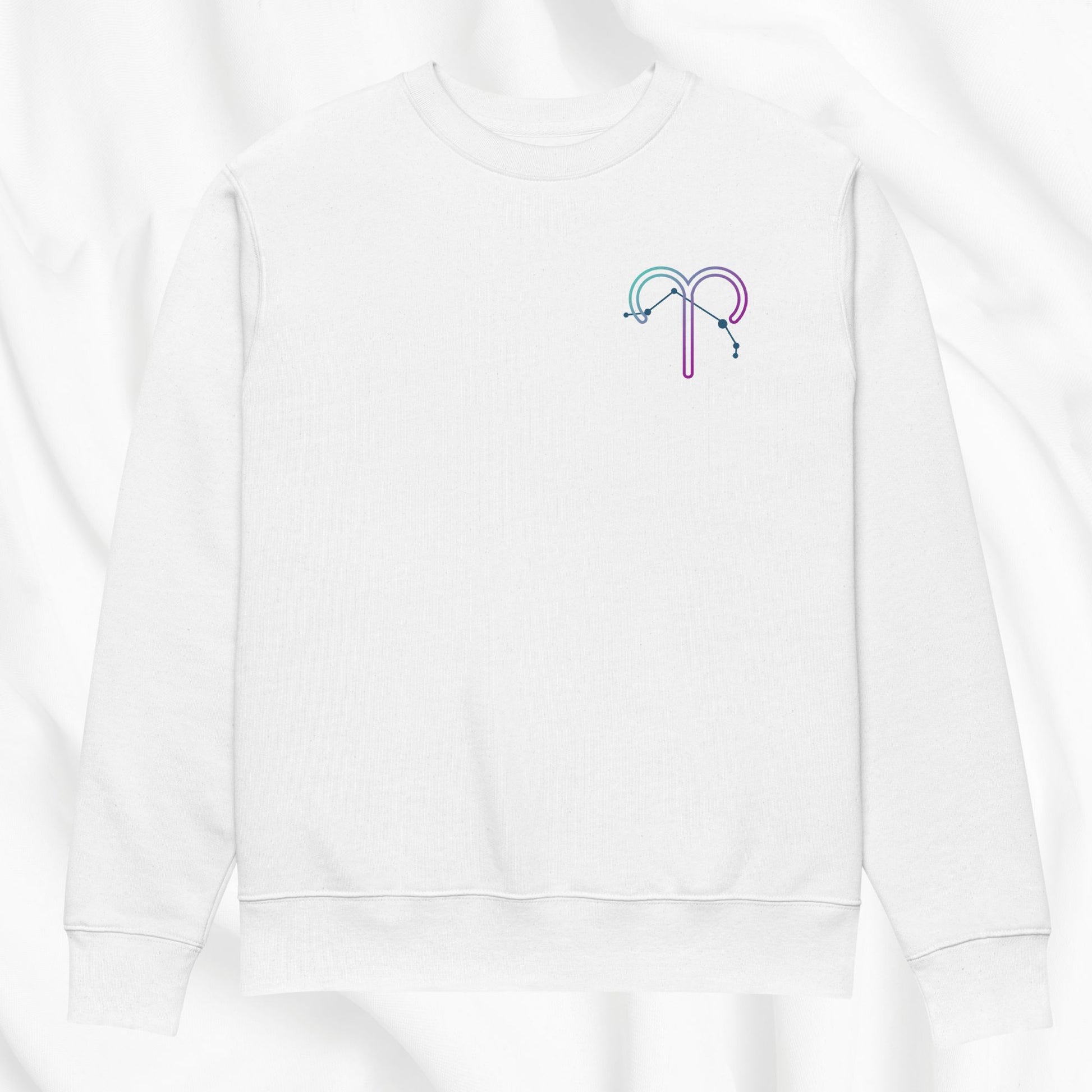 White sweatshirt with a colorful printed zodiac design on a white background