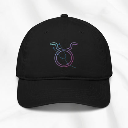 Black baseball cap with a colorful embroidered Taurus zodiac symbol on a white background