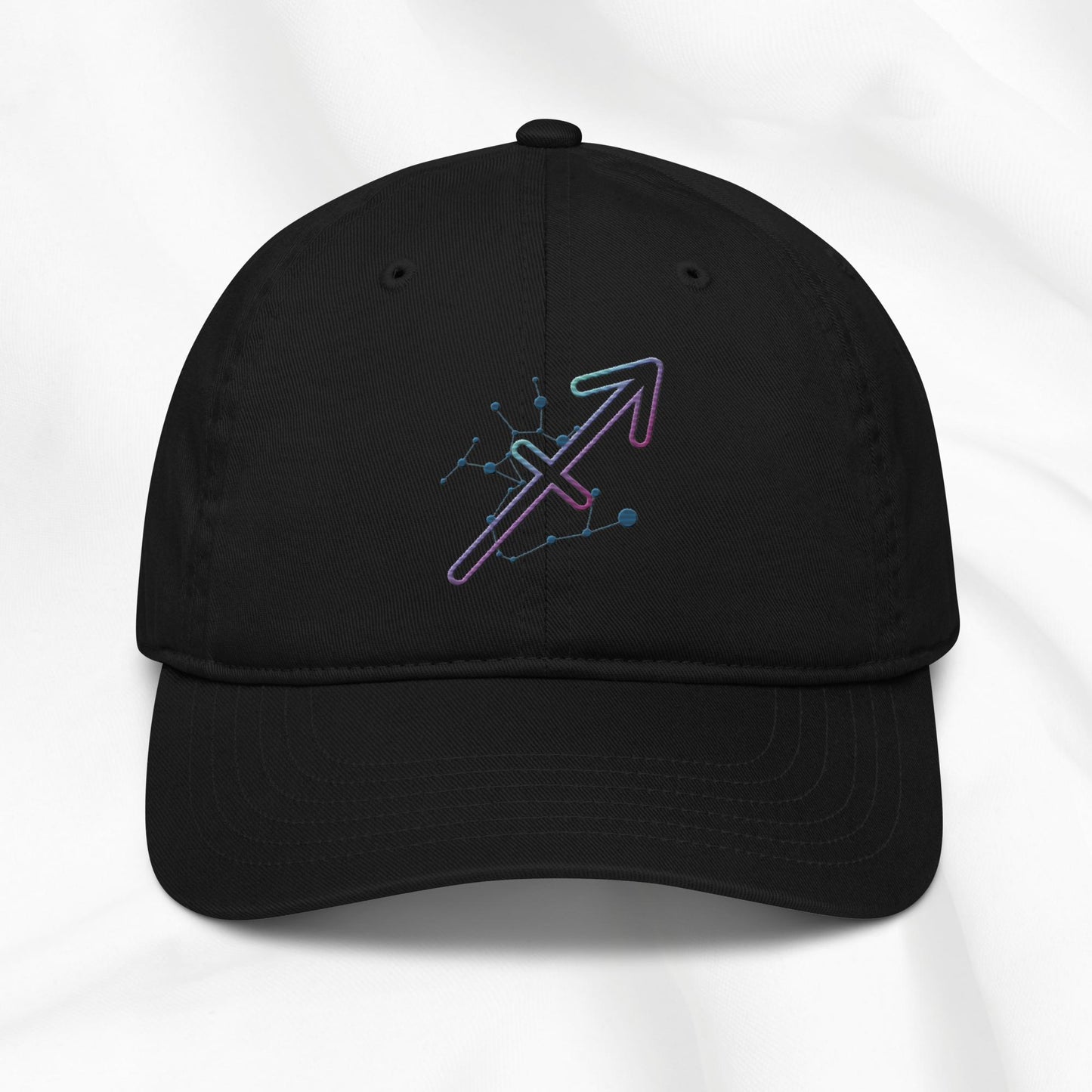 Black organic cotton baseball cap with Sagittarius zodiac embroidered graphic on a white background.