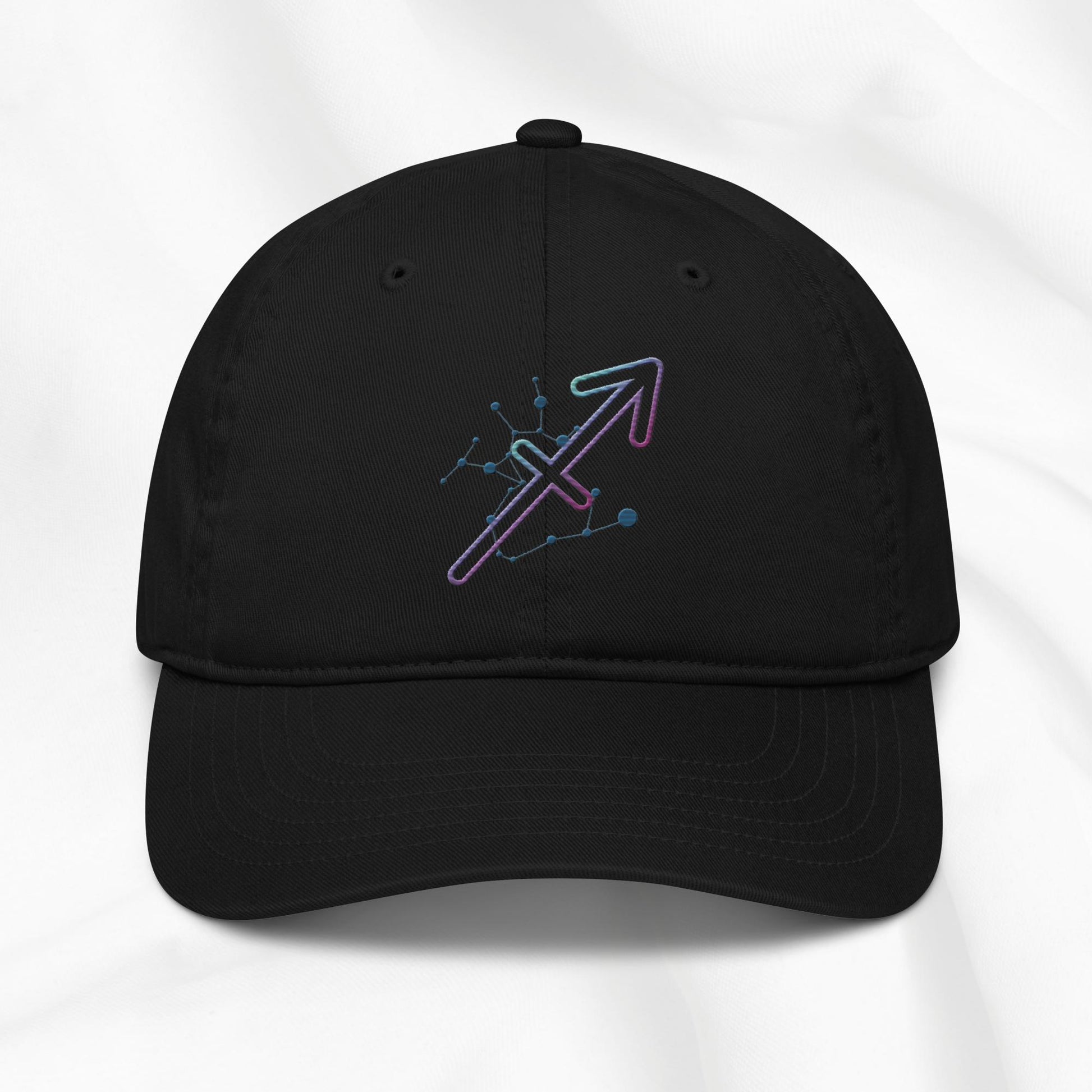 Black organic cotton baseball cap with Sagittarius zodiac embroidered graphic on a white background.