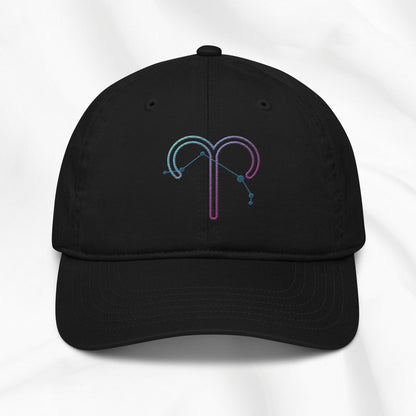 Black organic cotton baseball cap with an embroidered Aries zodiac design on a white background 