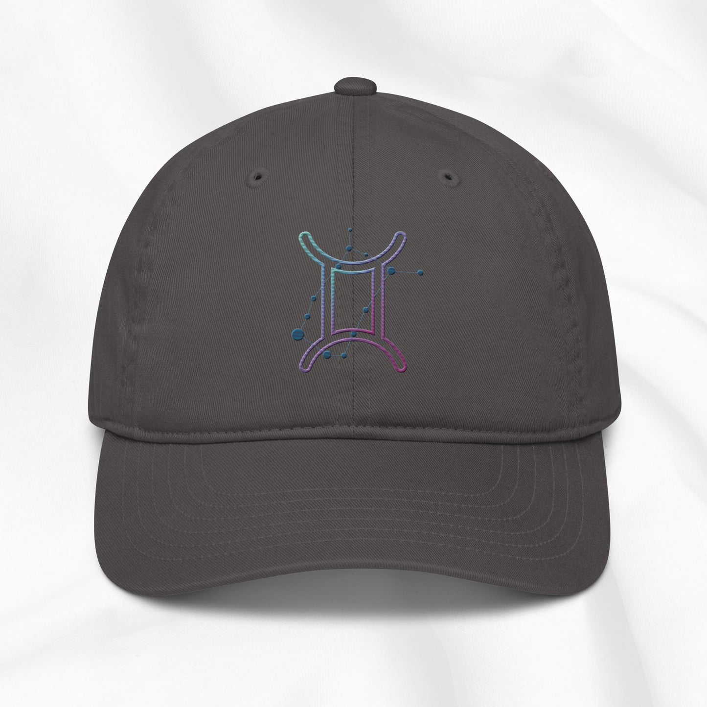 Gray organic cotton baseball cap with embroidered gemini graphic on white background