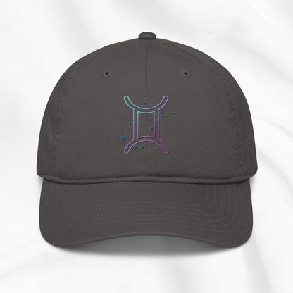Gray organic cotton baseball cap with embroidered gemini graphic on white background