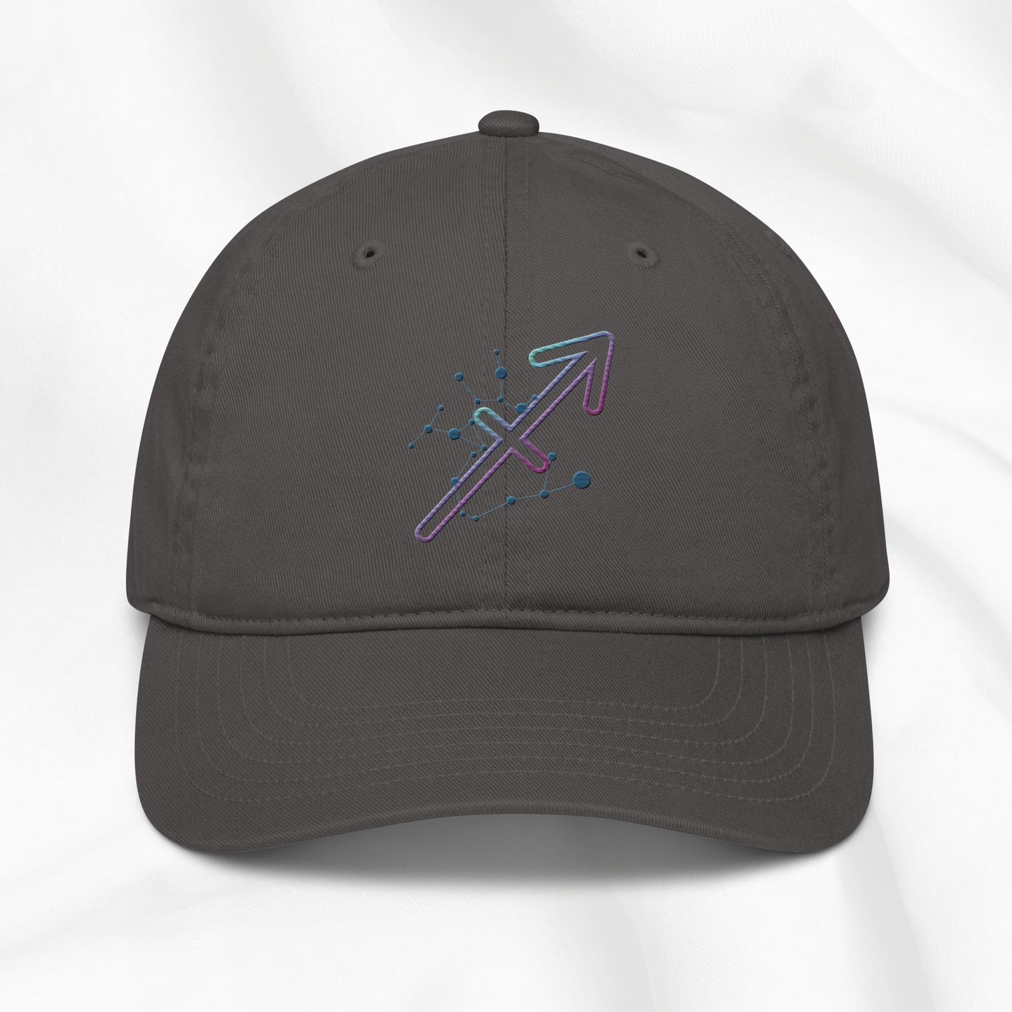 Gray organic cotton baseball cap with Sagittarius zodiac embroidered graphic on a white background.