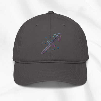 Gray organic cotton baseball cap with Sagittarius zodiac embroidered graphic on a white background.