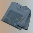 Folded Deep Teal Veinwork T-shirt showing the front artwork and subtle RYMARO sleeve logo.