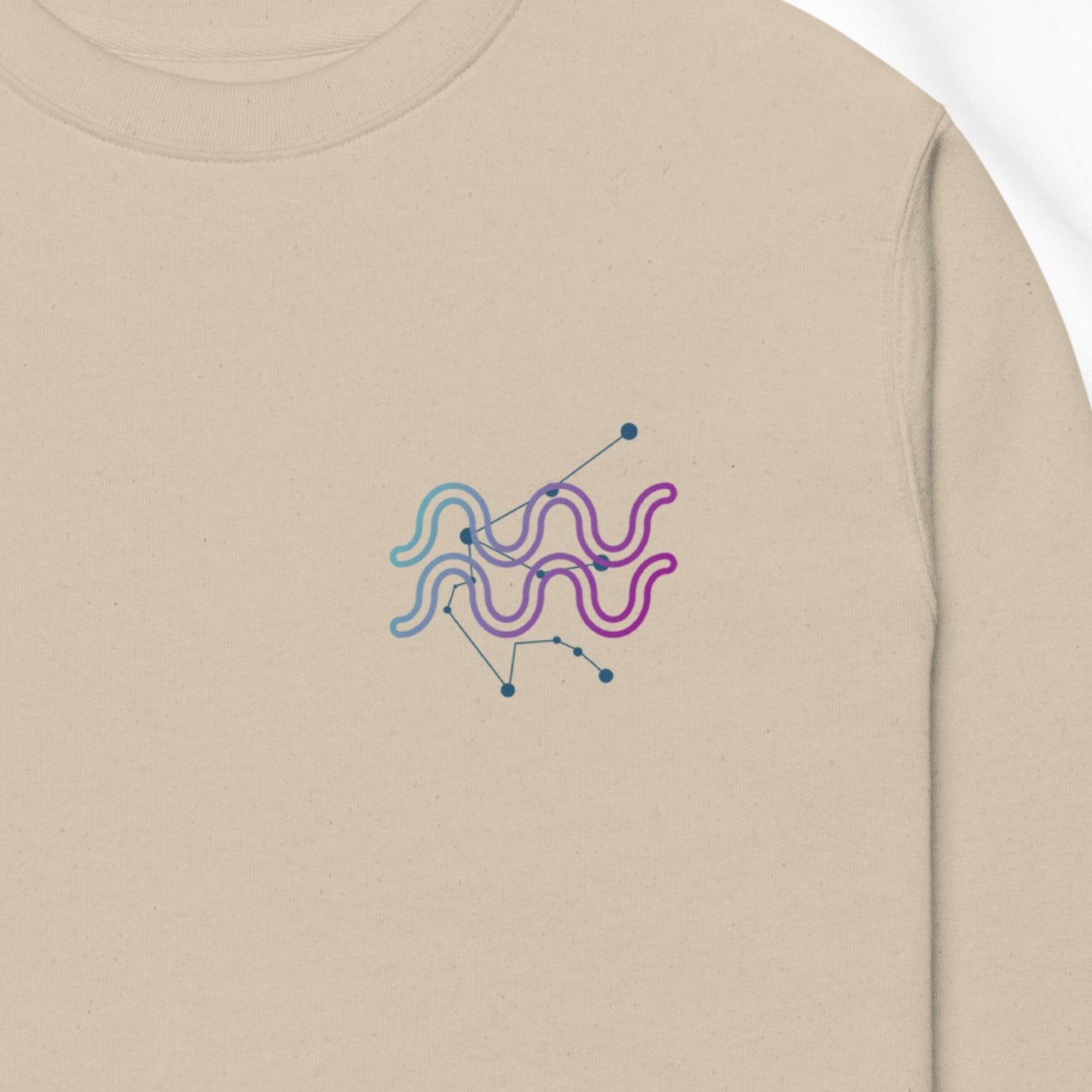 Beige sweatshirt with a colorful abstract design on the chest