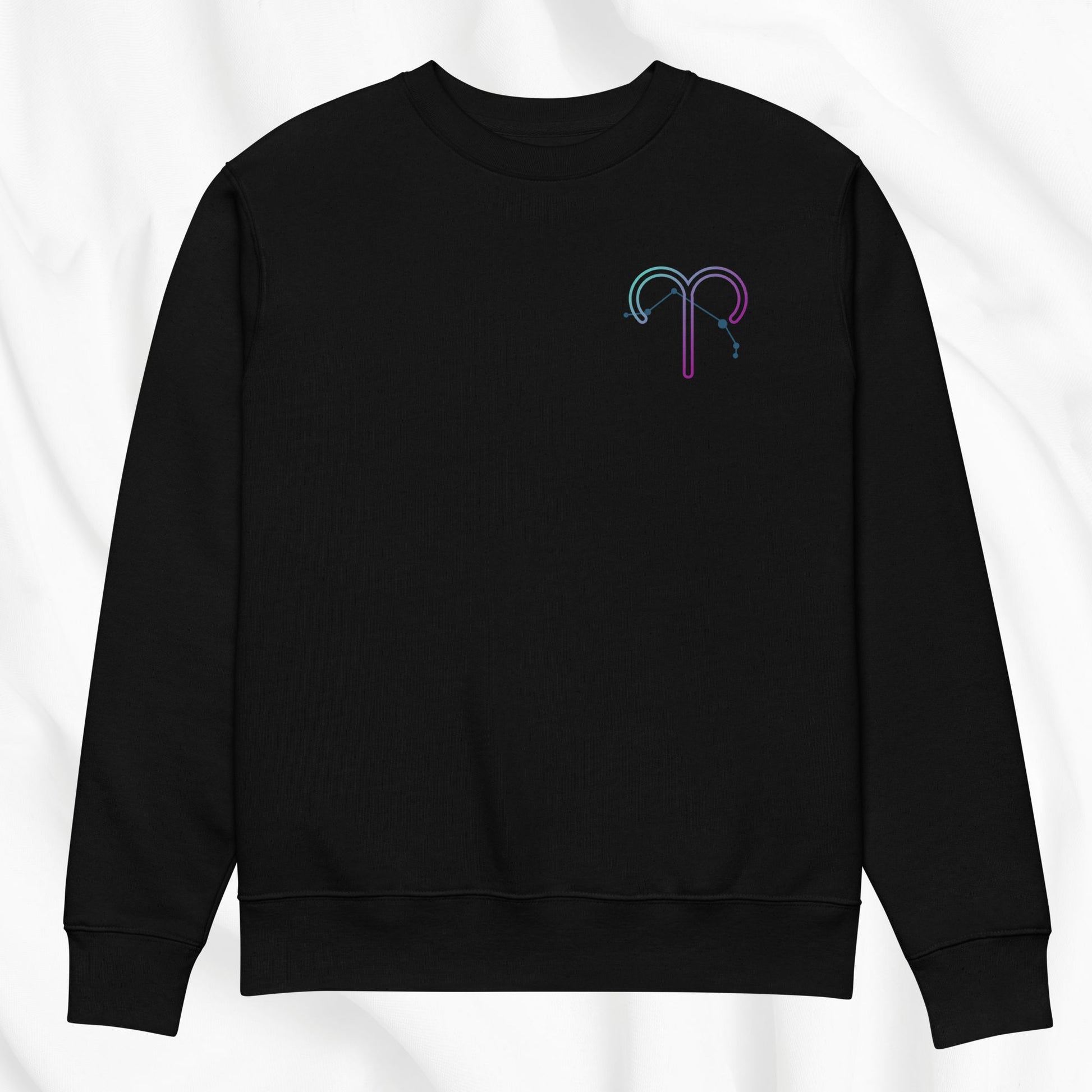 Black sweatshirt with a colorful printed zodiac design on a white background